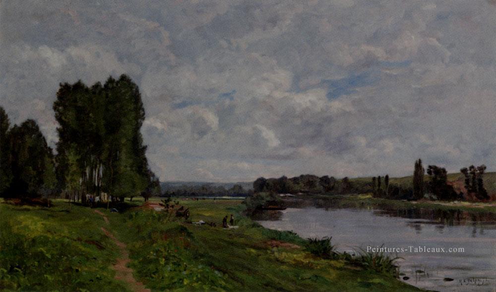 Lavandière sur les scènes Riverbank Hippolyte Camille Delpy Paysage Peintures à l'huile